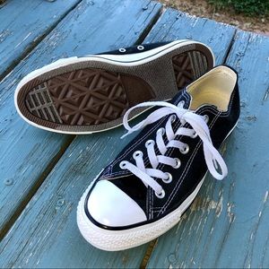 Black Chuck Taylor Converse shoes